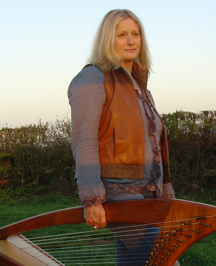 Photo : Richard Nagy - Promo photo shoot down our lane during a lovely sunset.  The harp likes being taken for nonchalent walkies!